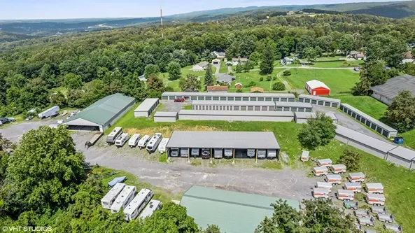 Aerial view of covered and uncovered parking spaces.