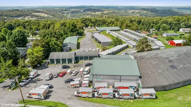 Aerial view of storage facility with u-hauls.