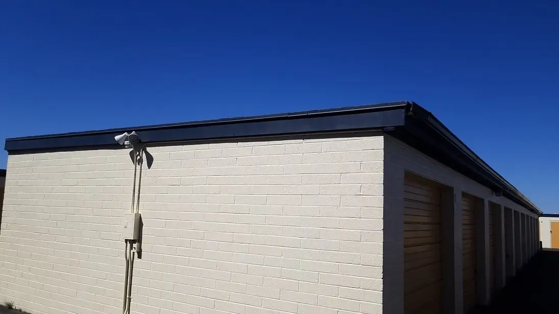 exterior wall of drive up storage units with flood lights