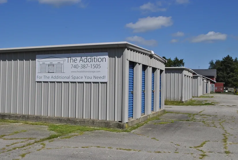 Storage units and exterior sign at The Addition facility.