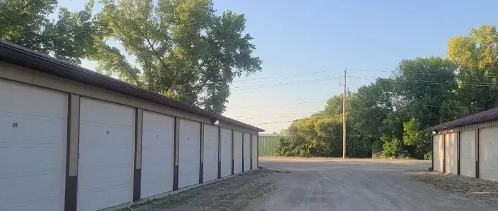 Gravel road and outdoor storage units.