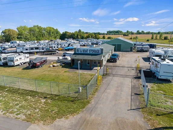 Gated entrance of vehicle storage facility.