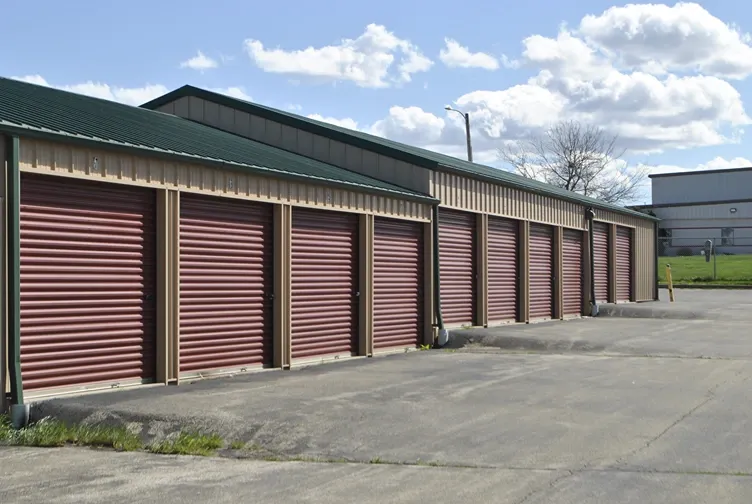 Large outdoor storage units with paved road.