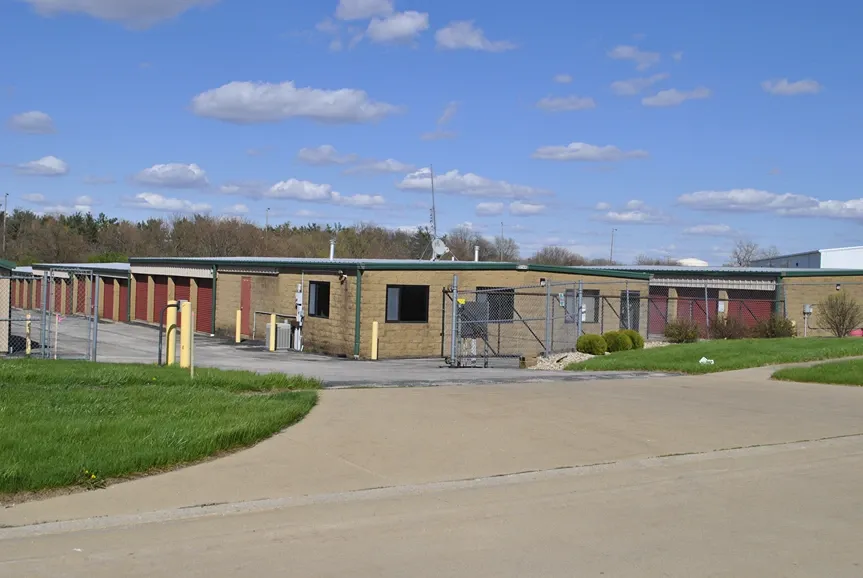 Front office with gated entrance at storage facility.