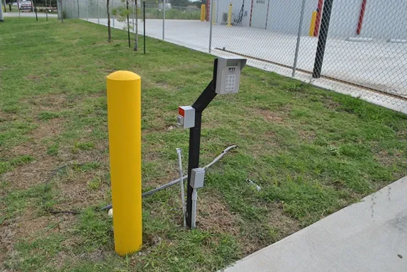 Front entrance keypad with gate.