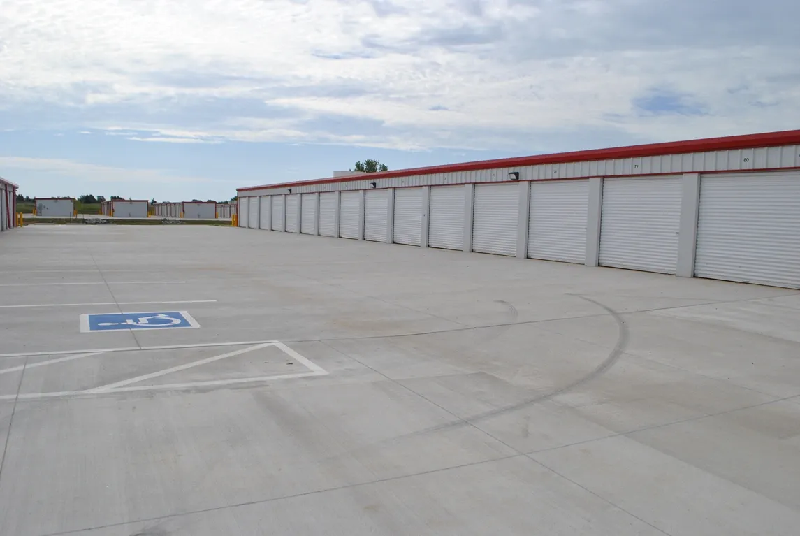 Paved outdoor self storage units.