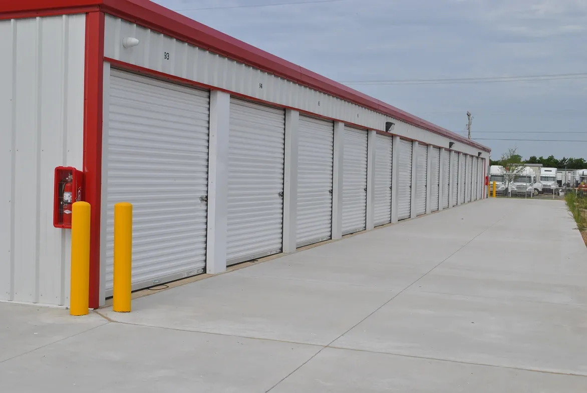 Outdoor storage with fire extinguisher.