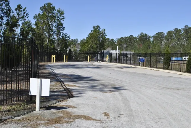 Gated facility with gate code entrances.