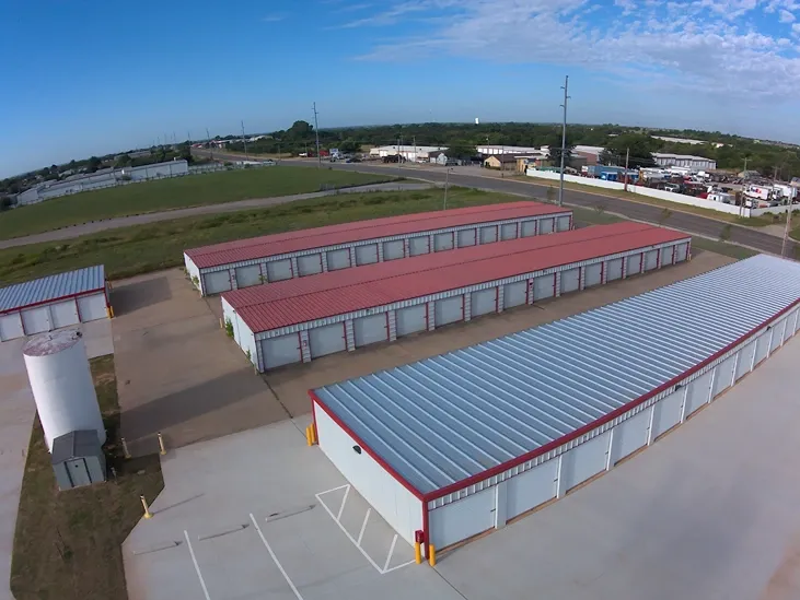 Aerial view of paved storage units.