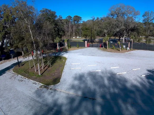 Open gravel parking.