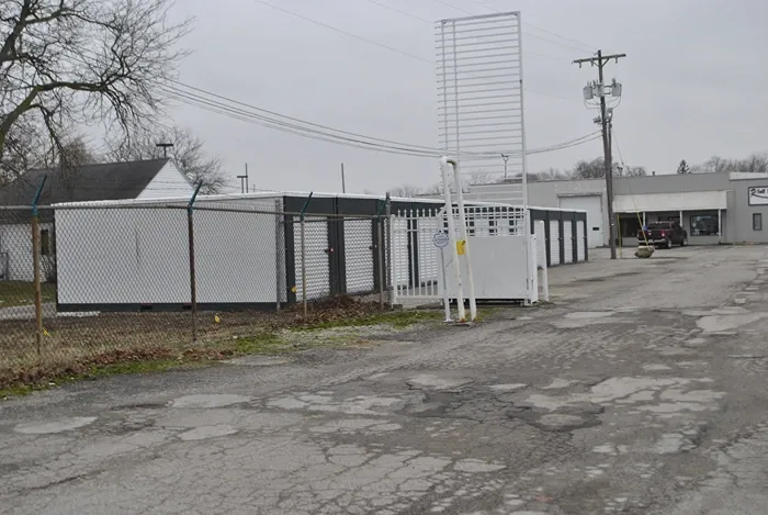 Storage facility with gated fence.