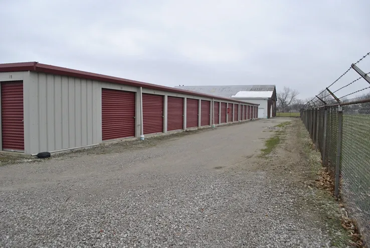 Gravel ground and gated facility.