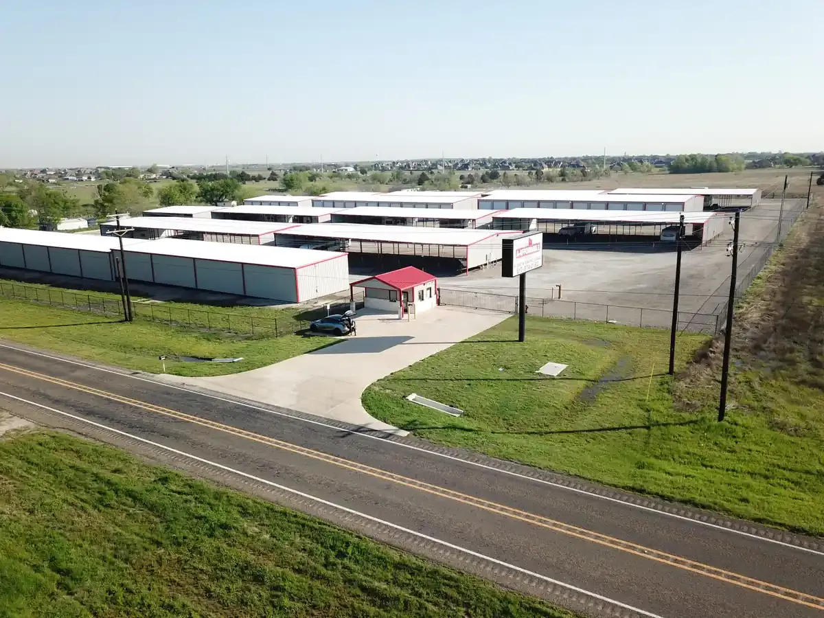 ariel view of storage facility with drive up units and covered vehicle parking